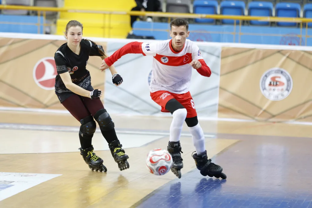 FUTINS players contesting the ball on inline skates during senior international competition