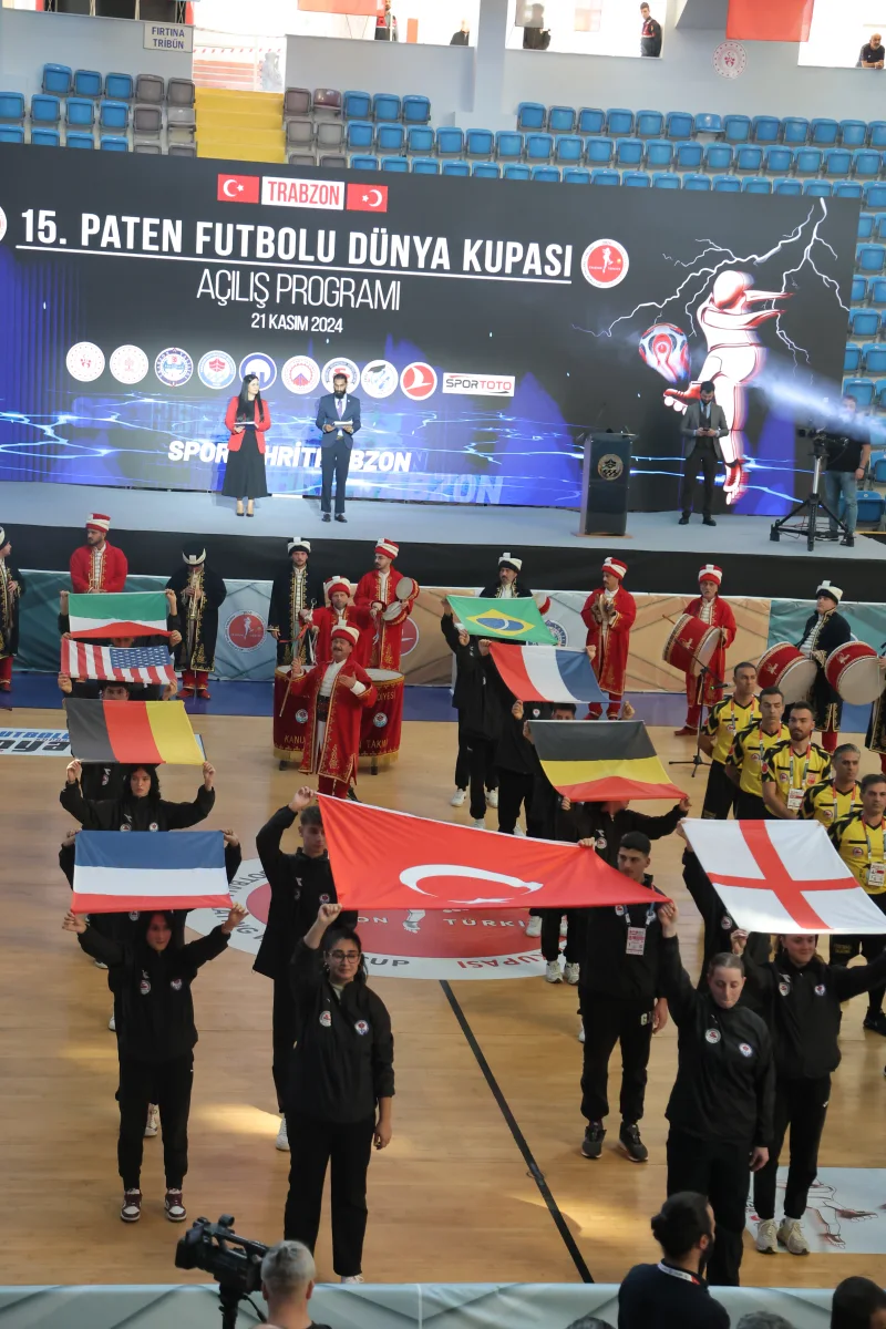 National flags carried onto the stage during the opening programme of the Football Skating World Cup 2024